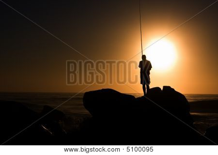 Lone fisker på Rock