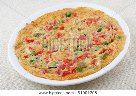Omelet with vegetables.