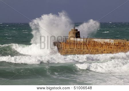 Portreath pier big wave splash, Cornwall England.