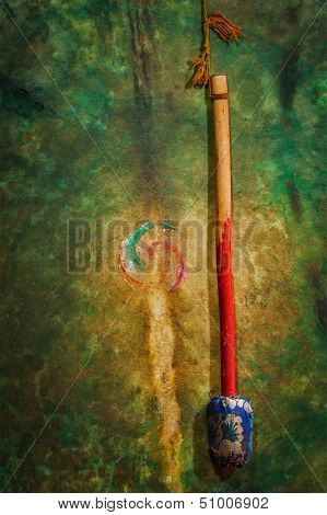 Beater and large tibetan drum in Hemis gompa (Tibetan Buddhist monastery). Ladakh, India