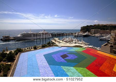 Colourful helicopter landing in Monaco port