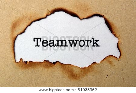 Teamwork Text On Paper Hole