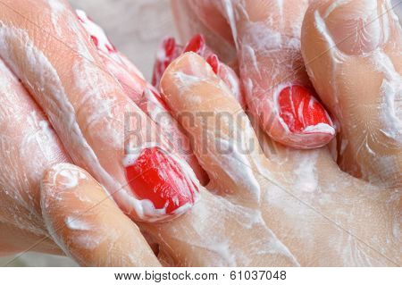 pedicure. feet massage with moisturizing or peeling cream.