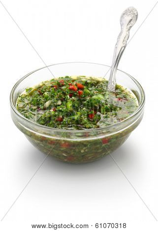 chimichurri sauce is a traditional Argentine condiment, made from finely chopped parsley, minced garlic, olive oil, oregano, and wine vinegar.