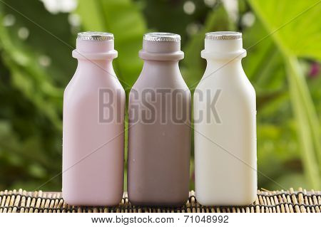 Strawberry, Chocolate And Fresh Milk Bottles