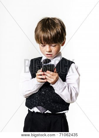 Emotional Red-haired Boy With Mobile Phone