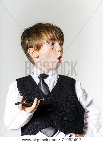 Emotional Red-haired Boy With Mobile Phone