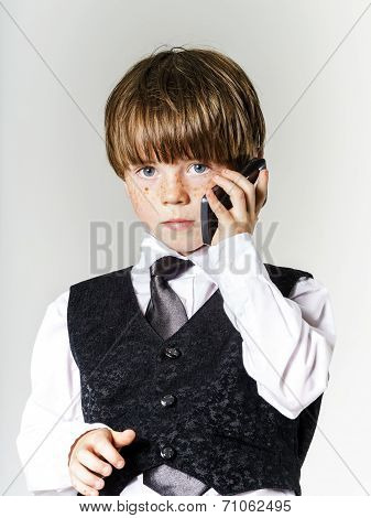 Emotional Red-haired Boy With Mobile Phone