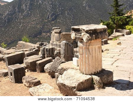 Ancient column in the archaeological site of Delphi, Greece