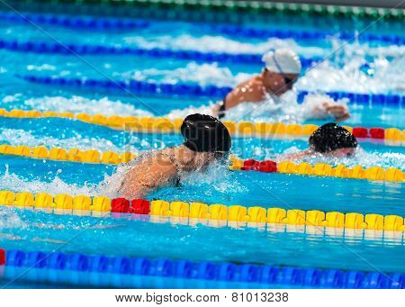 Breaststroke Girls Swimmers In Swimming Race