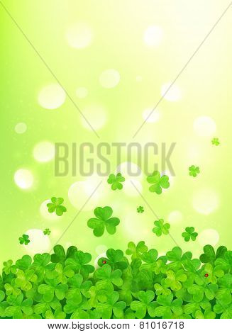 Light green vector background with clovers
