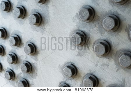 Gray Metal Surface With Hexagonal Bolt Heads