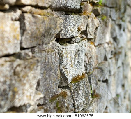 Old Stone Moss-grown Masonry With Rich Texture