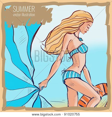 Girl in a swimsuit on the beach