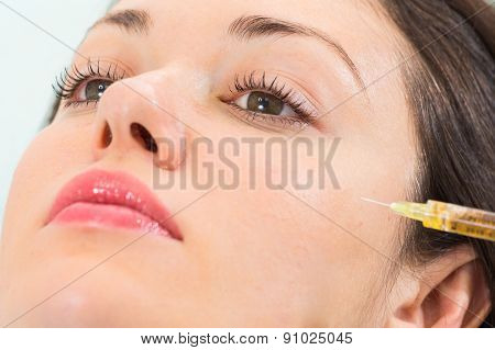 Subcutaneous injection into the girl's face
