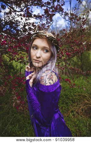 Young woman wearing twig crown