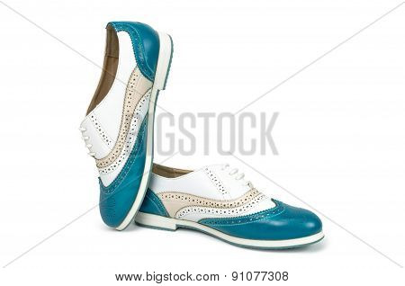 Beautiful blue woman shoes isolated on white background