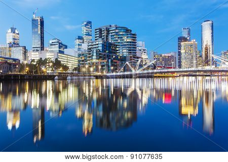 Cityspace at sunset with reflection