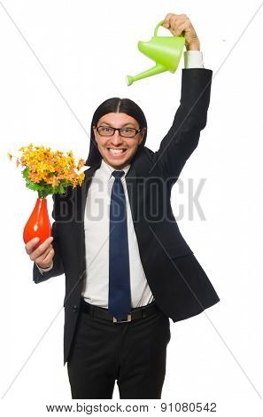 Handsome businessman with flower pot isolated on white