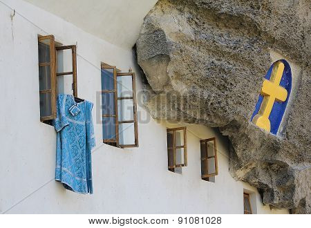 Cassock Clerics Posted Outside. Assumption Monastery Of The Caves, Crimea