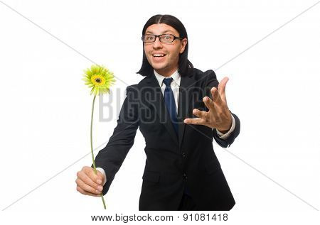 Handsome businessman with flower isolated on white