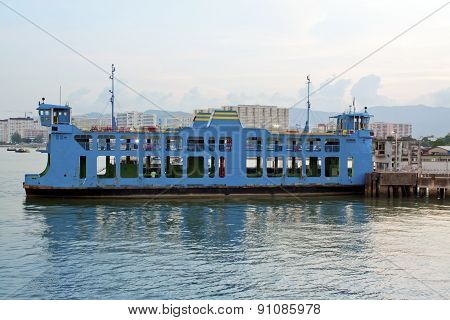 Blue Ferry Boat At The Sea