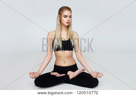 Cute girl does youga