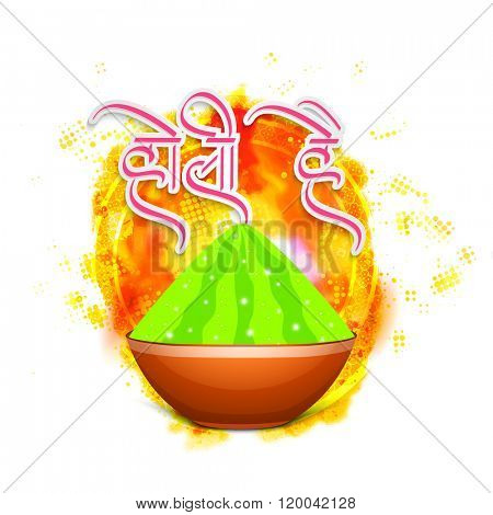 Green colour powder (Gulaal) in glossy pot and Hindi text Holi Hai (Its Holi) on beautiful creative background for Indian Festival of Colours celebration.