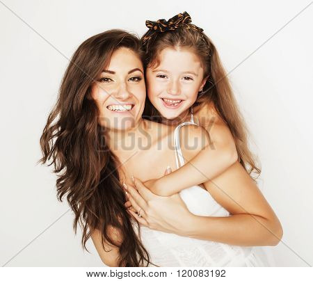 bright picture of hugging mother and daughter happy together, smiling stylish family.