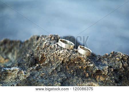 Beautiful wedding rings on a beach, taken in Rhodes island, Greece