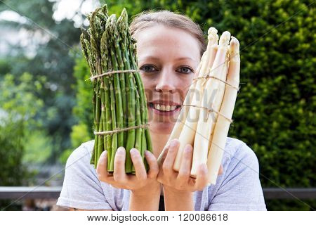 Woman Is Holding Sundry Asparagus