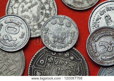 Coins of Nepal. Hindu trishul on the mountain depicted in the Nepalese 10 paisa coin.