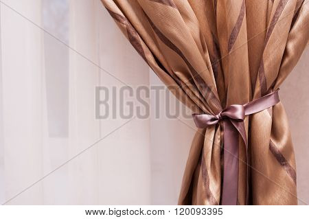 beautiful golden curtain in the bedroom interior
