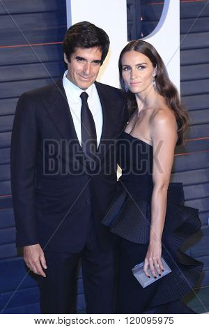 BEVERLY HILLS - FEB 28: David Copperfield, Chloe Gosselin at the 2016 Vanity Fair Oscar Party on February 28, 2016 in Beverly Hills, California