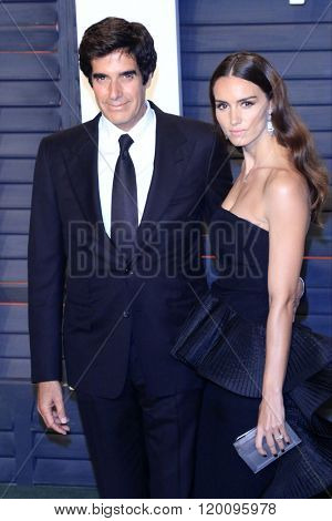 BEVERLY HILLS - FEB 28: David Copperfield, Chloe Gosselin at the 2016 Vanity Fair Oscar Party on February 28, 2016 in Beverly Hills, California