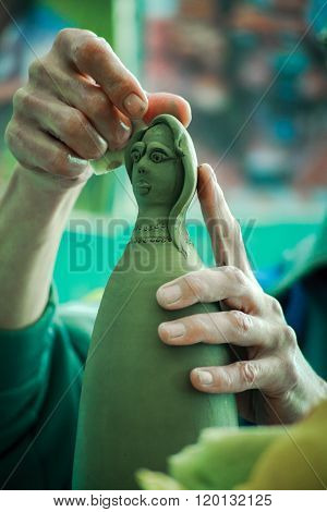Doll working clay