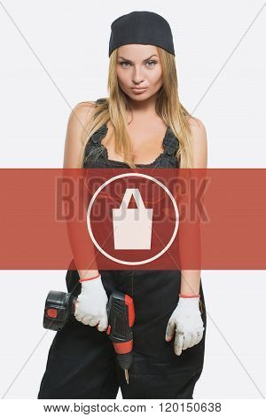 sexy female holding a cordless screwdriver. Repair icon in the background woman. purchases