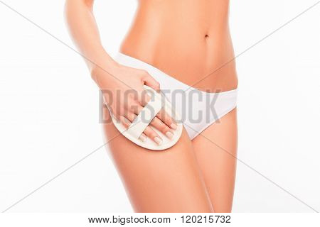 Closeup Photo Of Young Woman Making A Scrub Massage