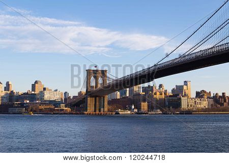 Brooklyn Bridge and downtown Brooklyn skyline just before sunset. Photographed in NYC in Feb 2016.