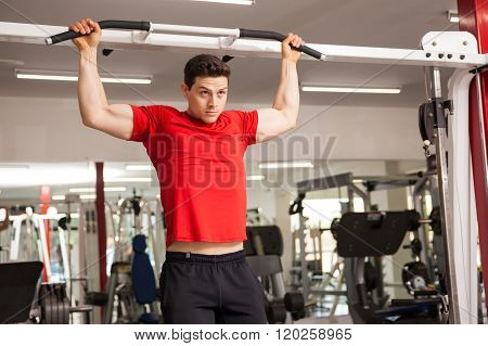 Man Doing Some Pullups At The Gym