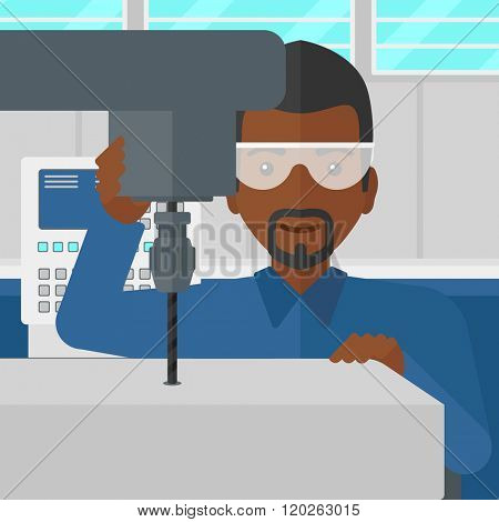 Man working with boring mill.