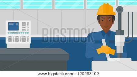 Man working with industrial equipment.