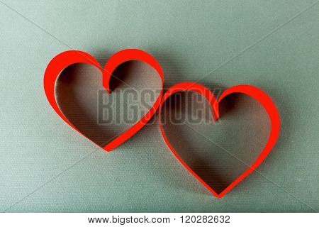 Two red paper hearts