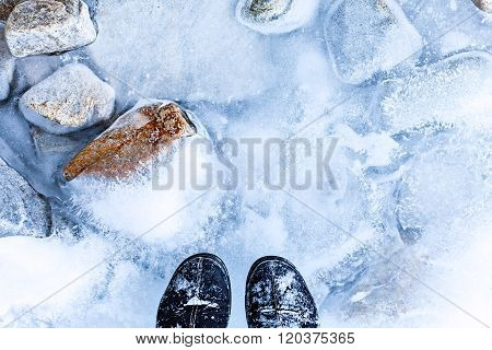 transparent ice with air bubbles and stones