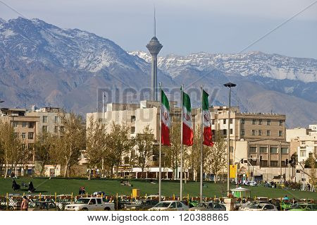 City Of Tehran With Milad Tower And Iran Flags In The Frame