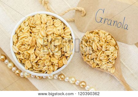 granola in bowl with granola paper tag.