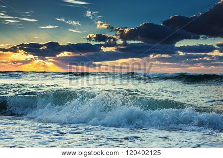 Sea wave close up low angle view sunrsie shot