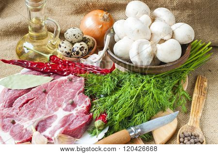 Fresh Meat With Mushrooms Spices And Herbs.