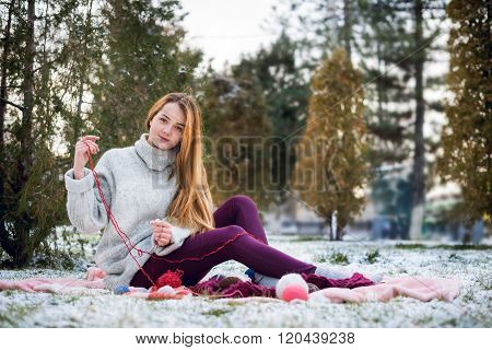 Funny Hipster Girl in Knitted Sweater