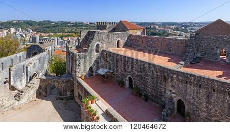 The Palatial Residence (Pacos Novos) on the right, and the ruins of the Nossa Senhora da Pena church on the left at the Leiria Caste. Leiria, Portugal.